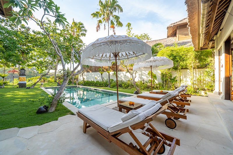 Villa Yasmine Bali - sun lounger with balinese umbrella